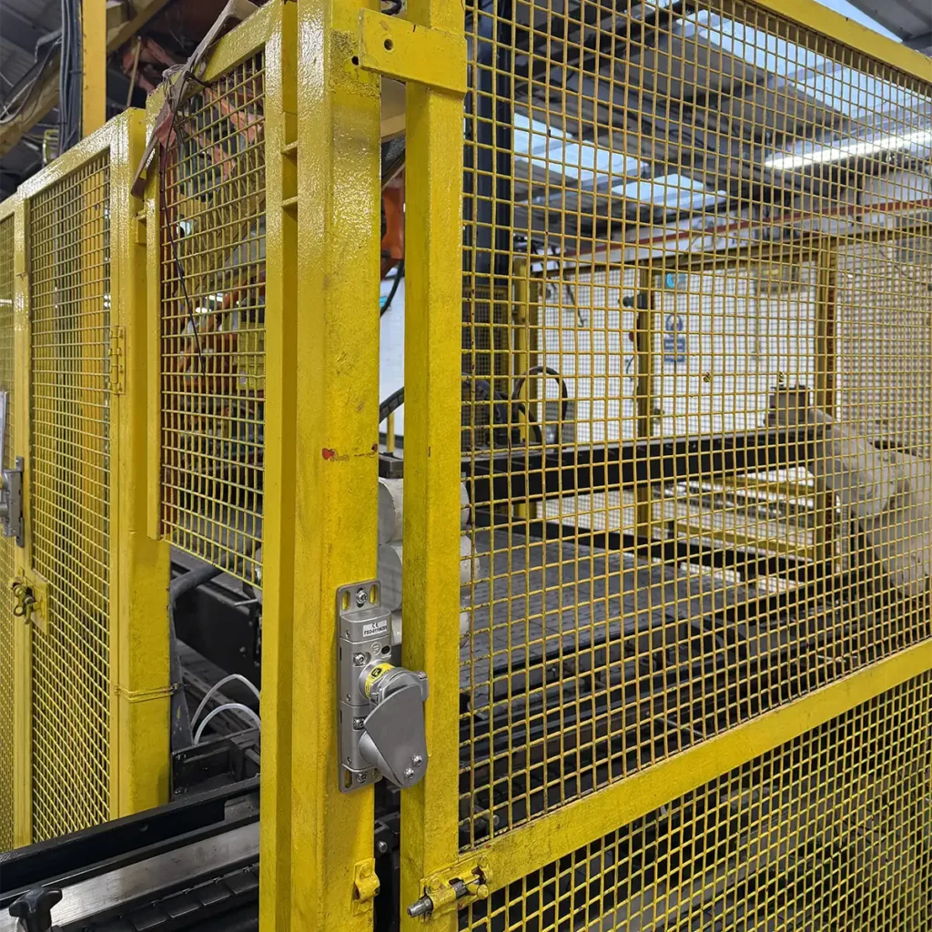 guard mesh with device, trapped key blocking devices fitted to palletiser guard interlocks